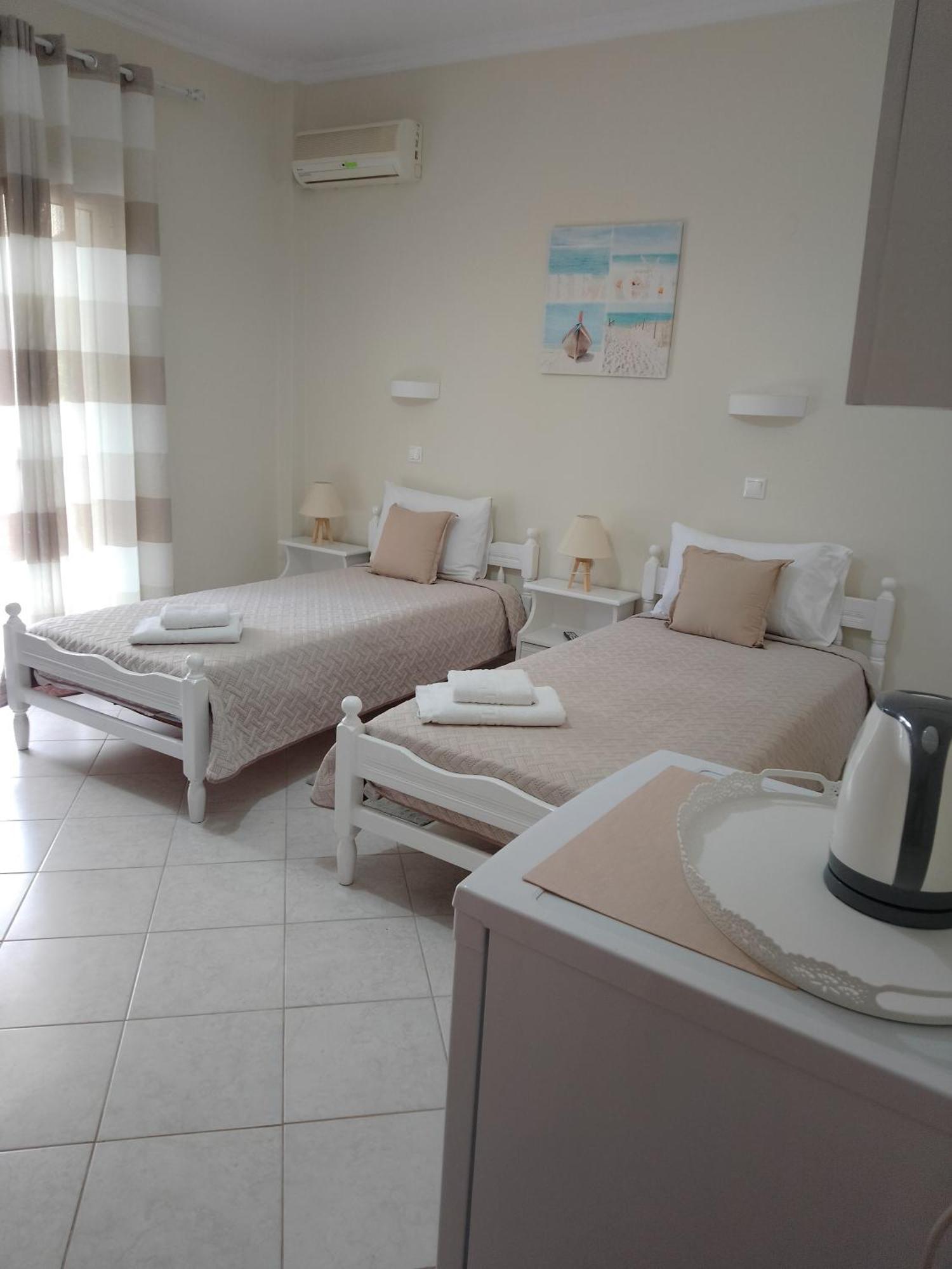 Vicky'S Guesthouse Kávos Стая снимка